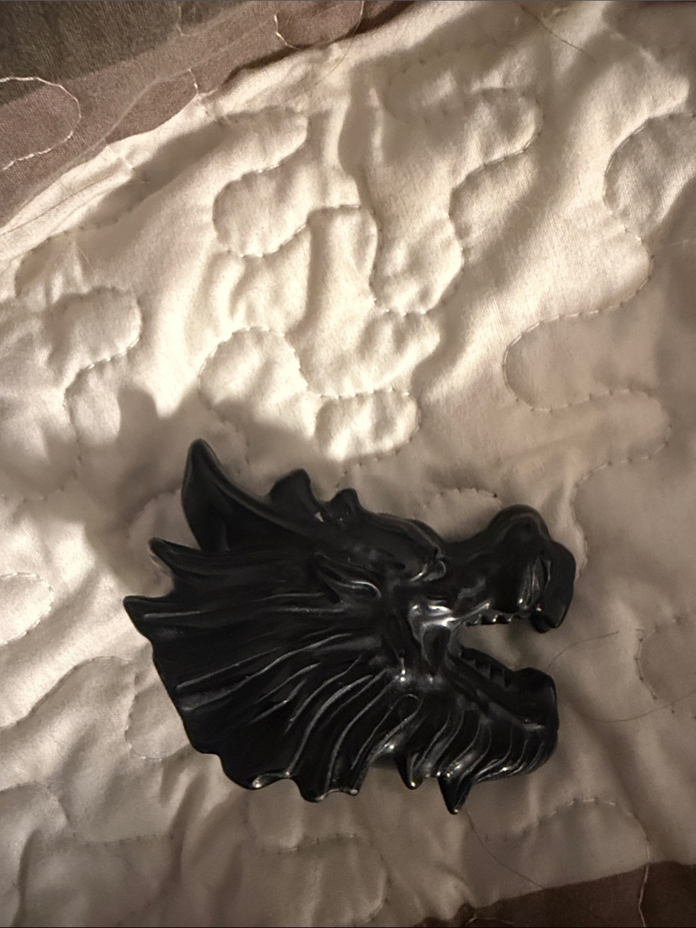 Black obsidian dragon head
